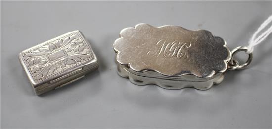 A Victorian silver rectangular vinaigrette, Edward Smith, Birmingham, 1846 and one other vinaigrette.